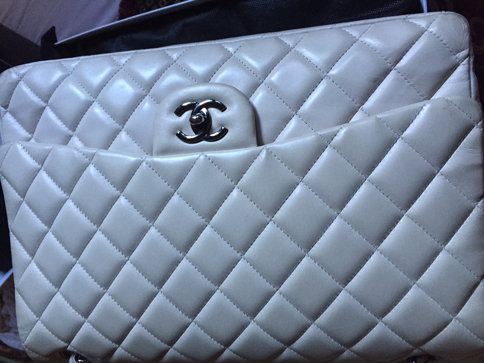 Chanel - White Lambskin Bag - cleaning needed?