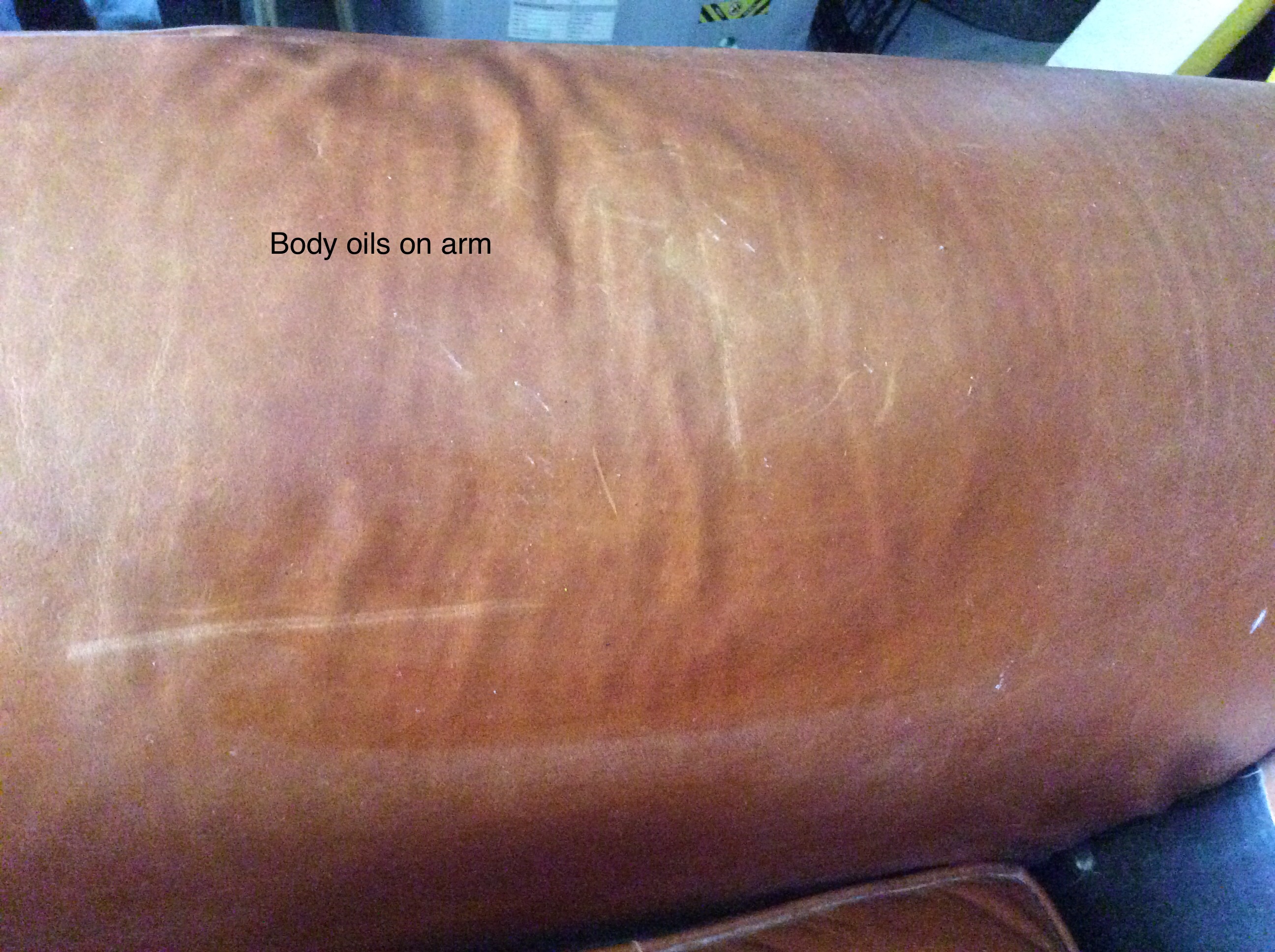 Stains and body oil on aniline or semi-aniline leather chair