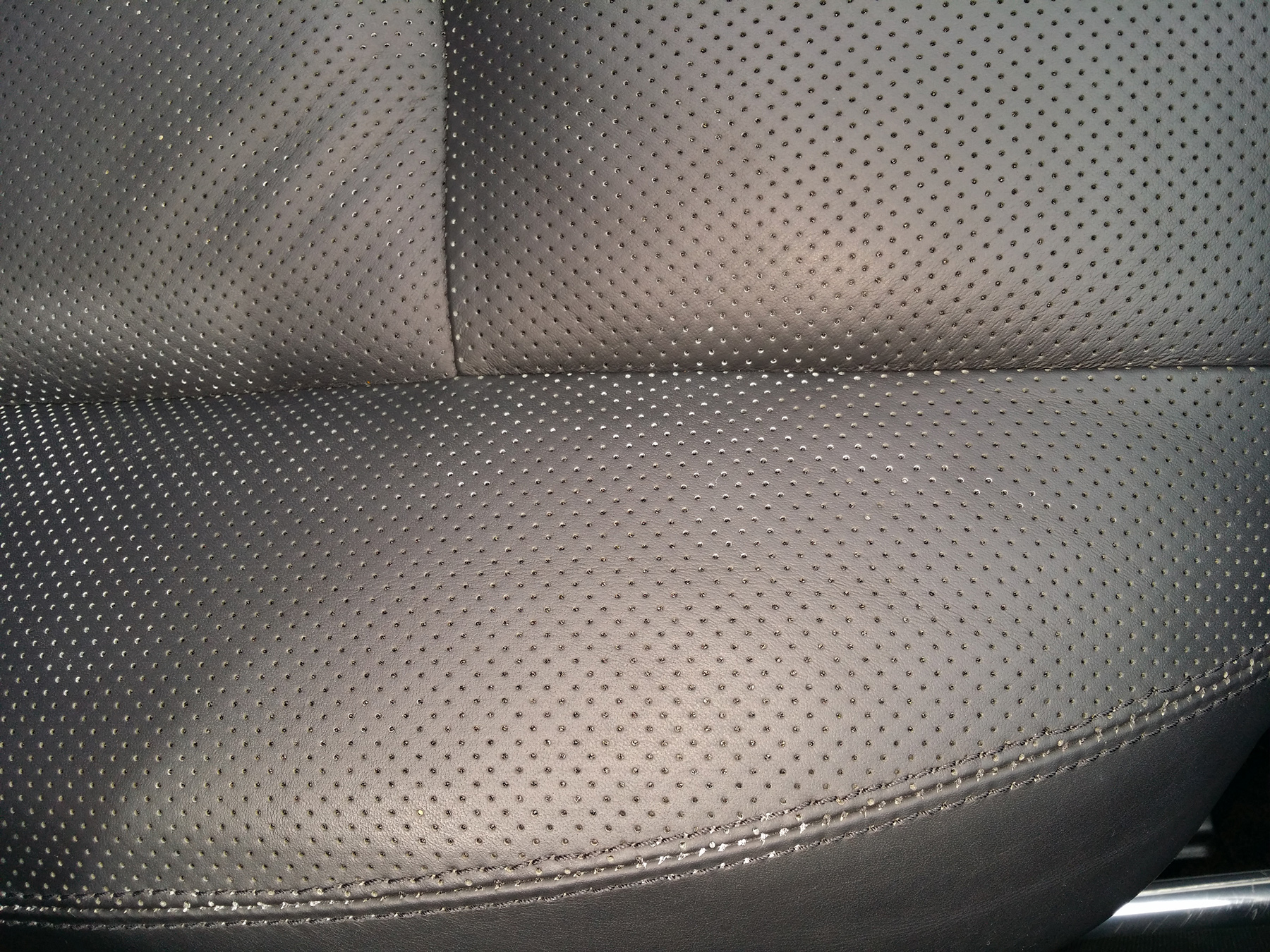 Name:  CL550_PASSENGER_White in perfs_sew holes streched.jpg
Views: 976
Size:  1.35 MB